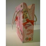 Decoupage papier roze met beertjes parels strikjes en andere zoete plaatjes